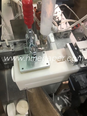주문 자동 HMEF 조절 속도 220V 전압 접착제 적용기 60mm 롤 직경 HME 필터 종이 와이핑 기계 online manufacture
